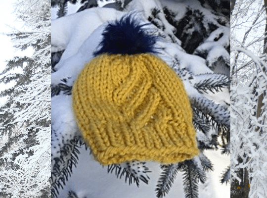 Yellow hat in a snow covered tree 