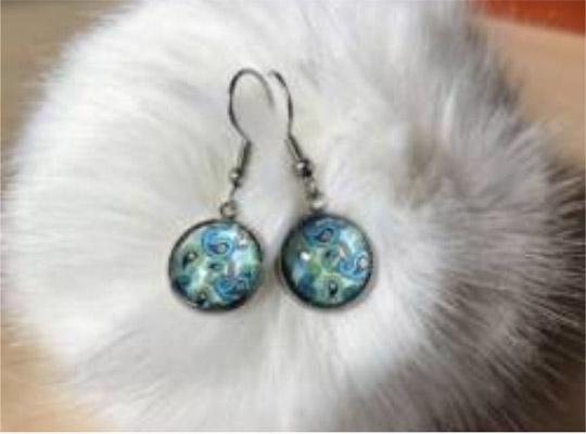 a pair of blue glass earrings