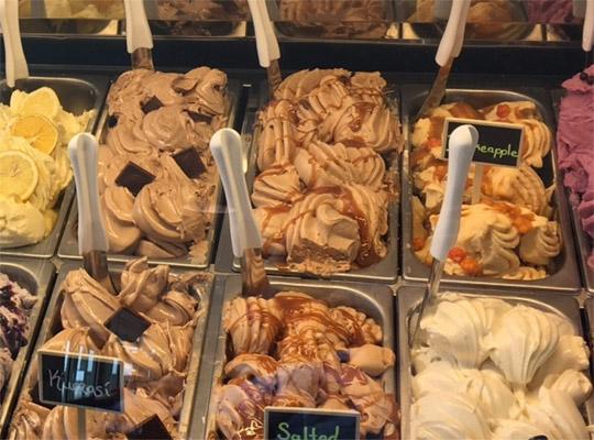 trays of gelato in a display case