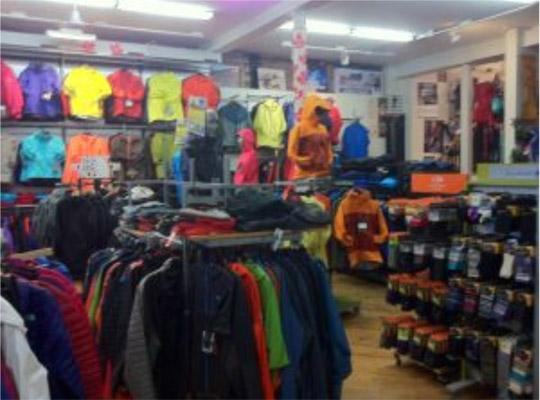 racks of outdoor clothing