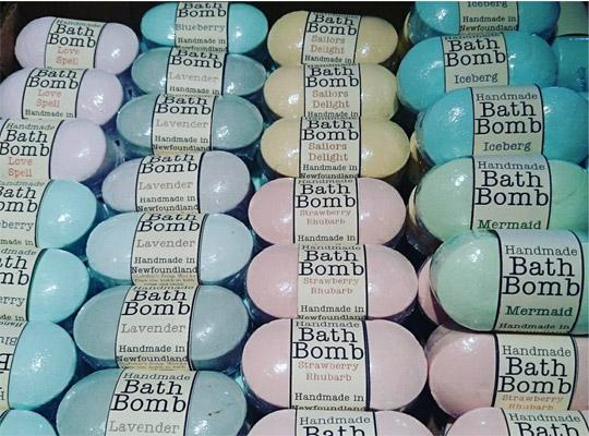 rows of different coloured bath bombs