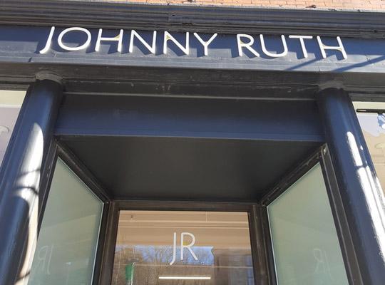 Johnny Ruth storefront signage
