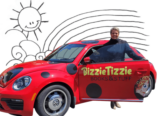 Bizzie Tizzie Book series author Yvonne Bryant and the red volkwagon beetle ladybug car on a Bizzie Tizzie Colouring sheet