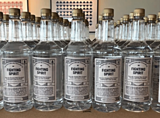 bottles of Newfoundland Distillery's Fighting Spirit Hand Sanitizer lined up