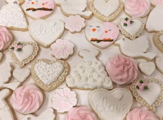 hand decorated sugar cookies in white, pink, hearts and love