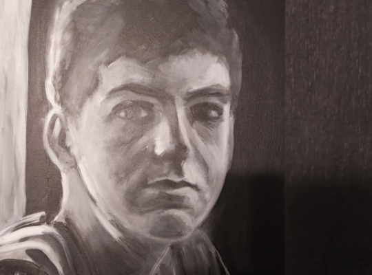 charcoal portrait of a young man.  it feels like he's falling into your eyes.