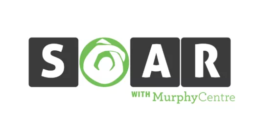 There is a white background, in the middle in big letters are SOAR with the S A and R in white lettering inside black squares, the O is a solid green circle with a silhouette of a person with their arms upward with the right arm crossed over the left. Under the A to the end of the R are the words With MurphyCentre in green lettering. 