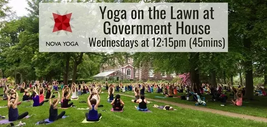 People doing yoga at government house Nova Yoga Yoga on the Lawn at Government House Wednesday at 12: 15pm (45muns) Text on white faded rectangle above the yoga people doing Yoga on government house lawn.
